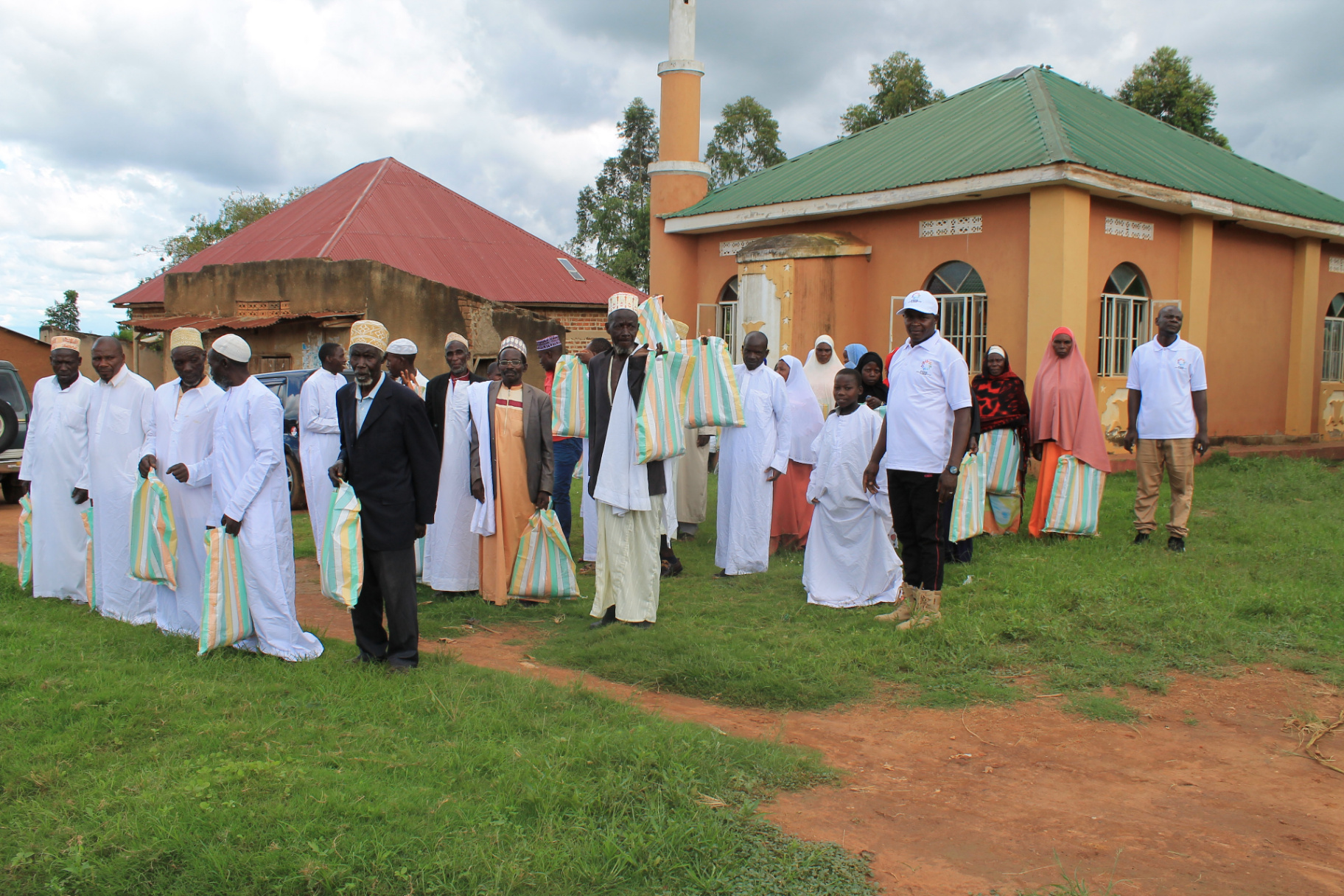 Elderly women in a Ugandan village receiving welfare items